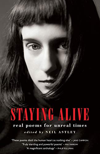 Staying Alive real poems for unreal times [Paperback]