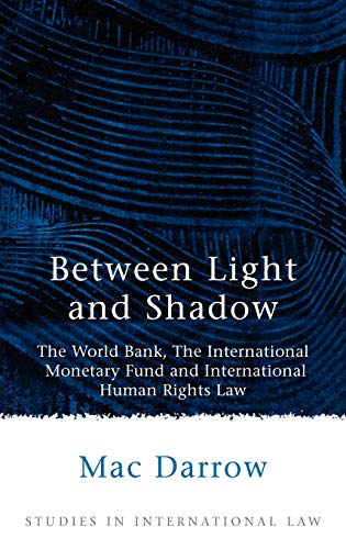 Between Light and Shadow The World Bank, The International Monetary Fund and In [Hardcover]