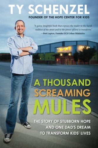 A Thousand Screaming Mules The Story Of Stubborn Hope And One Dad's Dream To Tr [Paperback]
